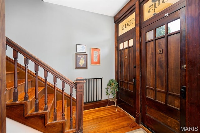 6505 Michigan Ave, Saint Louis, MO 63111 - foyer entrance with wood finished floors and stairs