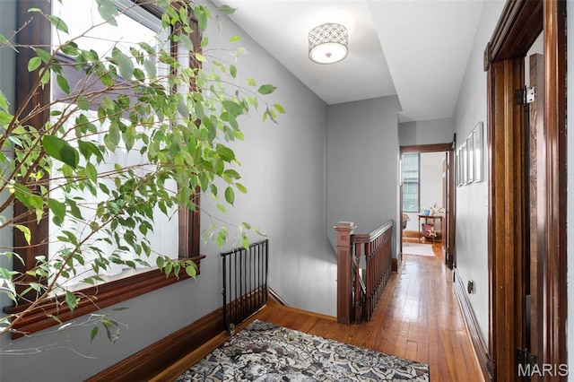 6505 Michigan Ave, Saint Louis, MO 63111 - hallway with wood-type flooring and an upstairs landing