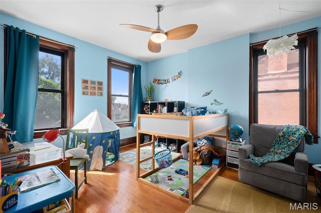 6505 Michigan Ave, Saint Louis, MO 63111 - home office featuring wood finished floors and a ceiling fan