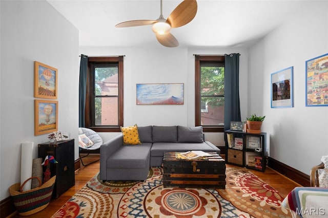 6505 Michigan Ave, Saint Louis, MO 63111 - living area with wood finished floors, plenty of natural light, and a ceiling fan