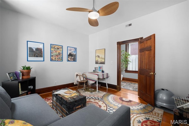 6505 Michigan Ave, Saint Louis, MO 63111 - living room with wood finished floors and ceiling fan