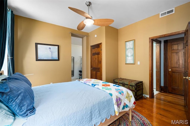 6505 Michigan Ave, Saint Louis, MO 63111 - bedroom featuring wood finished floors and ceiling fan