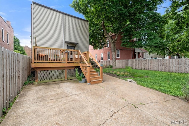 6505 Michigan Ave, Saint Louis, MO 63111 - back of house with a fenced backyard, a patio area, a deck, and stairs