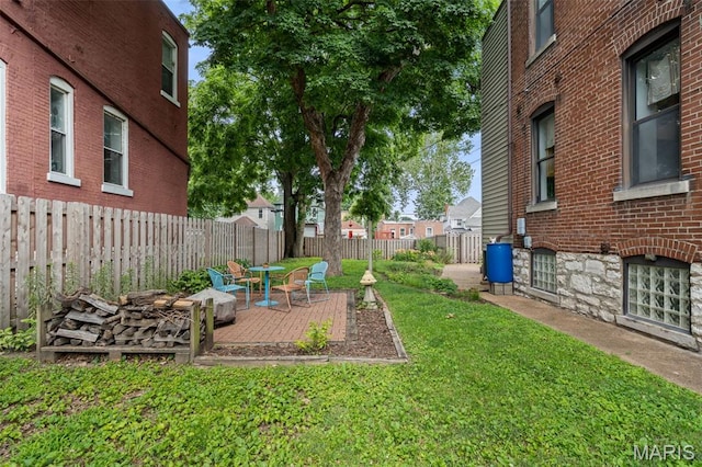 6505 Michigan Ave, Saint Louis, MO 63111 - fenced backyard with a patio area and a residential view