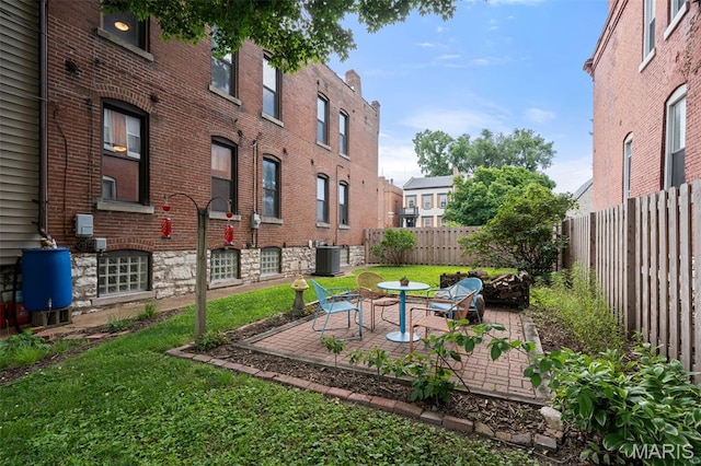 6505 Michigan Ave, Saint Louis, MO 63111 - fenced backyard featuring a patio