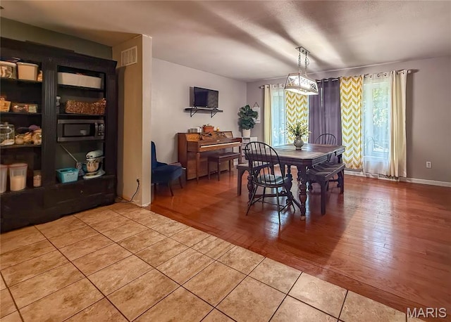 914 Ruby Dr, Farmington, MO 63640 - dining room featuring tile patterned floors and baseboards