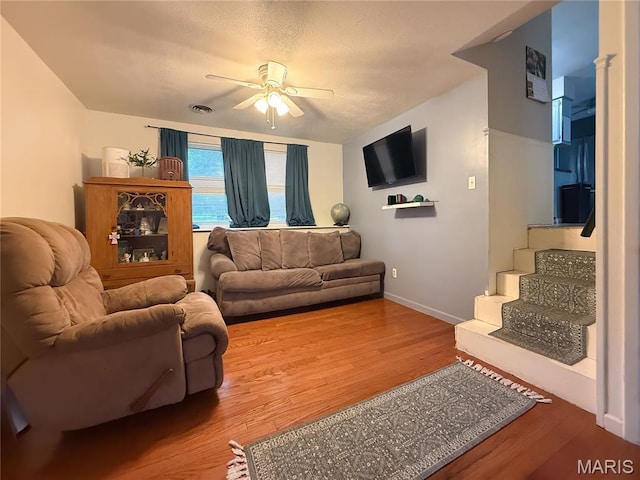 914 Ruby Dr, Farmington, MO 63640 - living area with a ceiling fan and wood finished floors