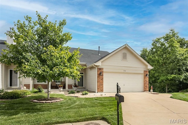 7202 Geneva Manor Ct, Oakville Township, MO 63129 - view of front facade featuring brick siding, driveway, and a garage