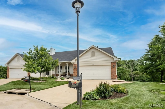 7202 Geneva Manor Ct, Oakville Township, MO 63129 - ranch-style house featuring brick siding, a front lawn, concrete driveway, and an attached garage