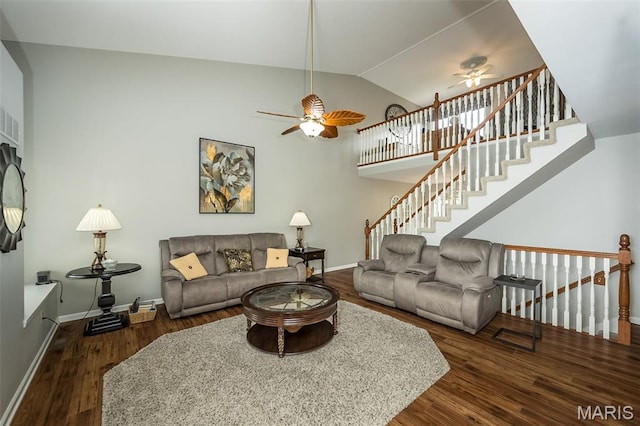 7202 Geneva Manor Ct, Oakville Township, MO 63129 - living room with a ceiling fan, dark wood-type flooring, vaulted ceiling, and stairs