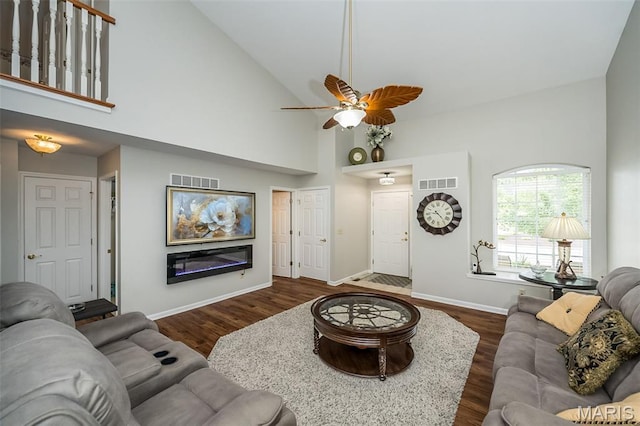 7202 Geneva Manor Ct, Oakville Township, MO 63129 - living area with high vaulted ceiling, dark wood finished floors, and ceiling fan