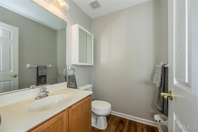 7202 Geneva Manor Ct, Oakville Township, MO 63129 - bathroom featuring wood finished floors and vanity