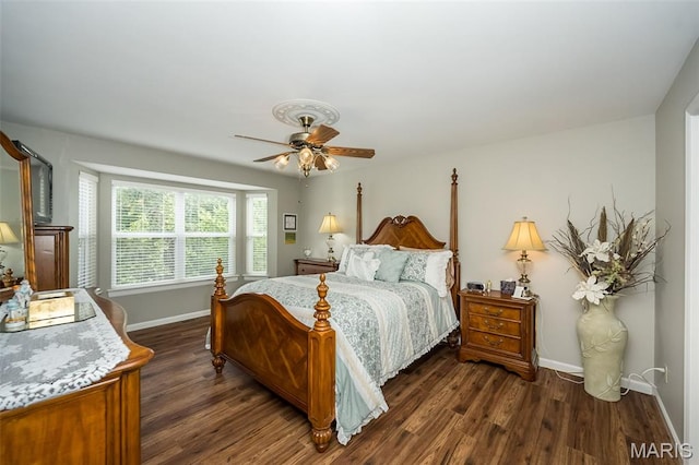 7202 Geneva Manor Ct, Oakville Township, MO 63129 - bedroom featuring dark wood finished floors and ceiling fan