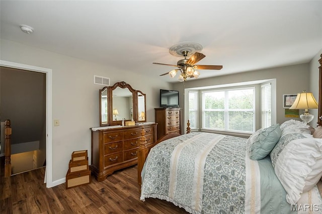 7202 Geneva Manor Ct, Oakville Township, MO 63129 - bedroom featuring dark wood-style floors and a ceiling fan