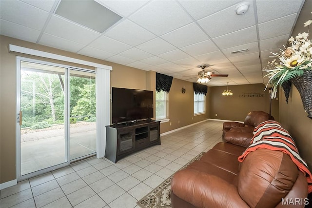 7202 Geneva Manor Ct, Oakville Township, MO 63129 - living area with a drop ceiling, light tile patterned floors, and ceiling fan