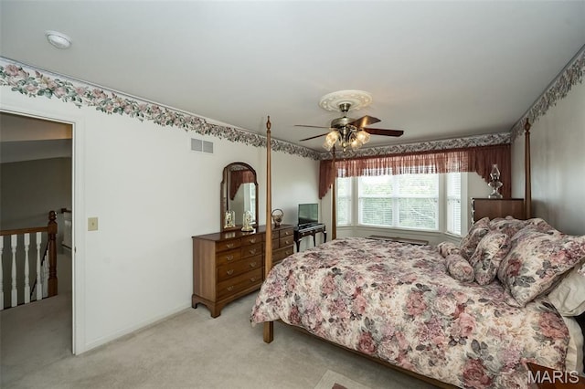 7202 Geneva Manor Ct, Oakville Township, MO 63129 - bedroom featuring light colored carpet and a ceiling fan