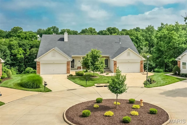 7202 Geneva Manor Ct, Oakville Township, MO 63129 - view of front facade featuring brick siding, curved driveway, a front yard, and a garage