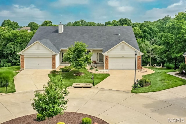 7202 Geneva Manor Ct, Oakville Township, MO 63129 - view of front of home featuring brick siding, driveway, and a front yard