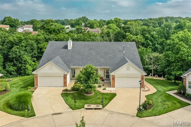 7202 Geneva Manor Ct, Oakville Township, MO 63129 - view of front of property with brick siding, concrete driveway, a front yard, and a chimney