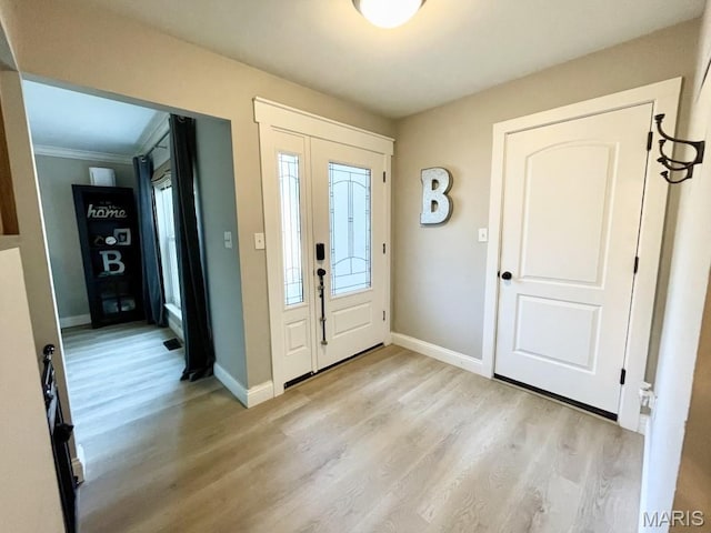 325 Fox Village Ct, Ballwin, MO 63021 - foyer entrance with light wood finished floors