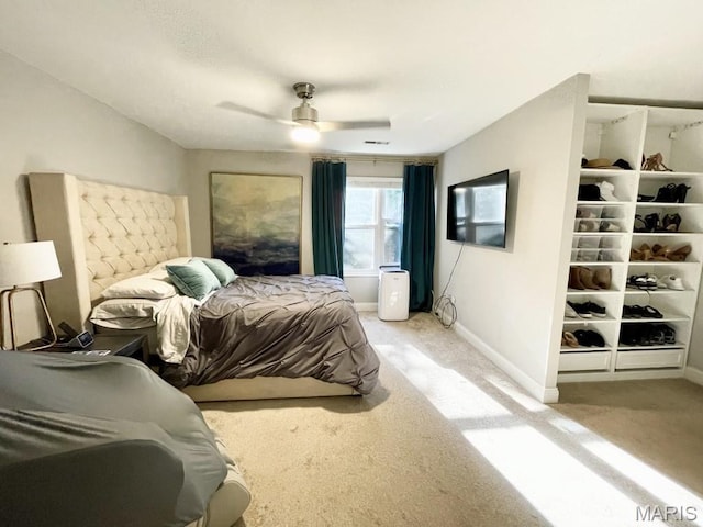 325 Fox Village Ct, Ballwin, MO 63021 - bedroom with light colored carpet and ceiling fan