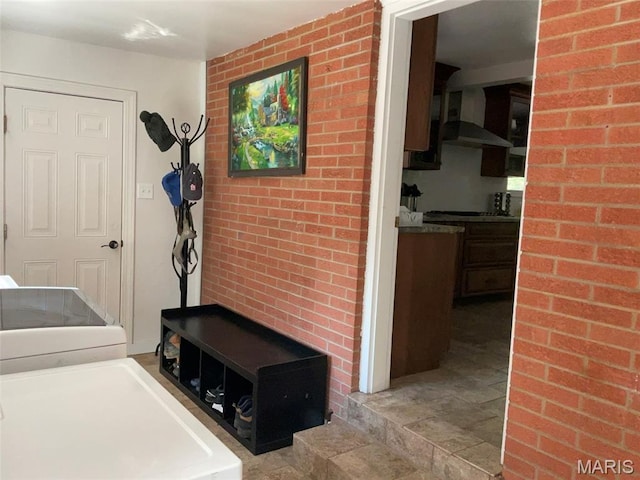4303 State Route 160, Highland, IL 62249 - hall with light stone finish flooring and brick wall