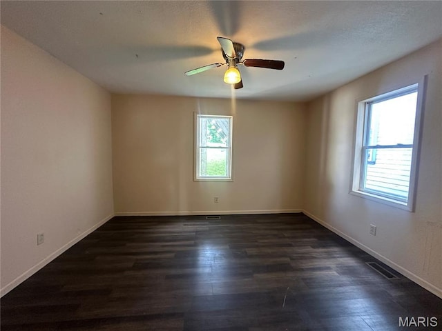 2008 Grace St, Hannibal, MO 63401 - empty room with wood finished floors and a ceiling fan