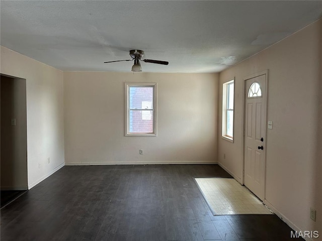 2008 Grace St, Hannibal, MO 63401 - foyer with dark wood-type flooring and a ceiling fan