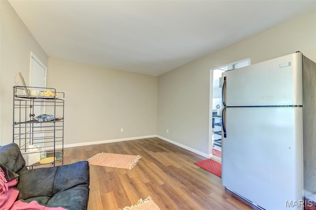 1755 Atmore Dr, Saint Louis, MO 63136 - living area with wood finished floors and baseboards
