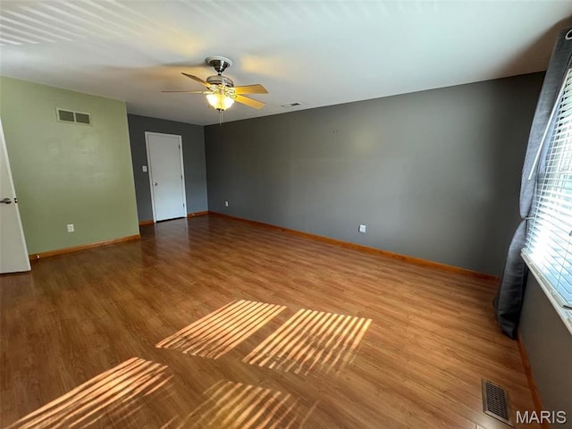 12383 Woodline Dr, Saint Louis, MO 63141 - empty room featuring wood finished floors and ceiling fan