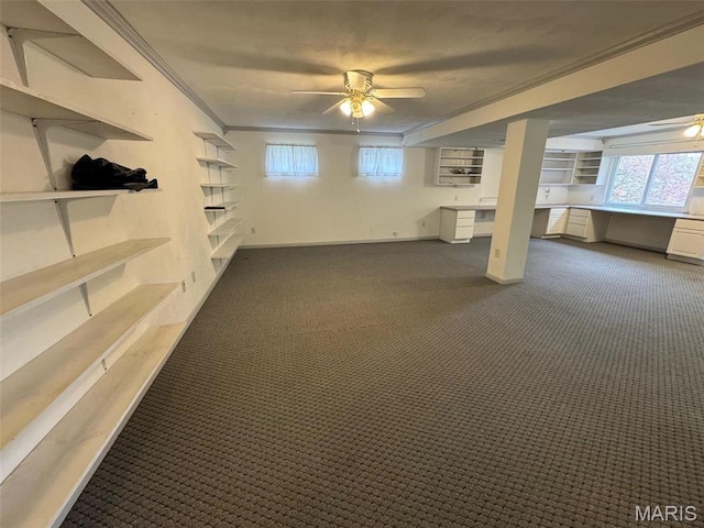 12383 Woodline Dr, Saint Louis, MO 63141 - basement featuring crown molding, dark colored carpet, and a ceiling fan