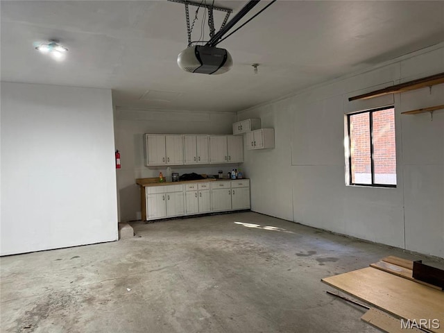 12383 Woodline Dr, Saint Louis, MO 63141 - garage with a garage door opener