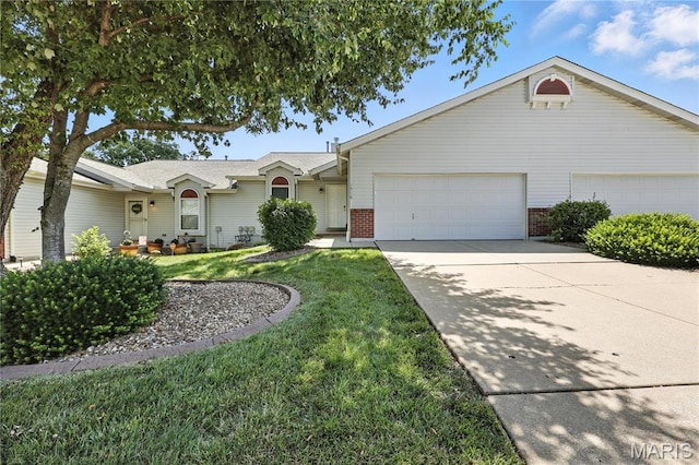 1516 Lienemann Dr Unit 26, Saint Charles, MO 63303 - ranch-style home with an attached garage, concrete driveway, a front yard, and brick siding