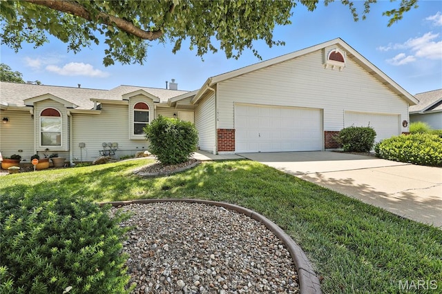 1516 Lienemann Dr Unit 26, Saint Charles, MO 63303 - ranch-style house with a garage, brick siding, a front lawn, and driveway