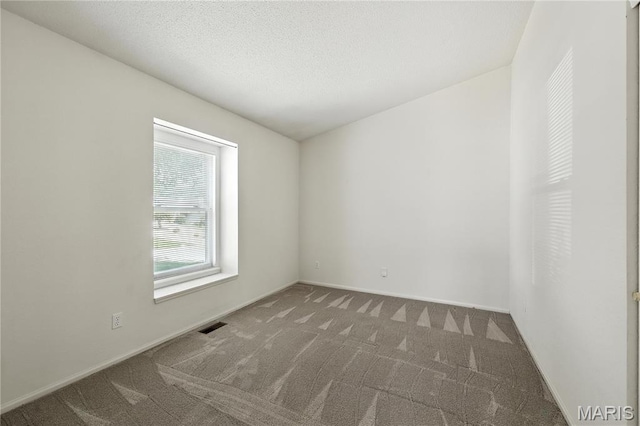 1516 Lienemann Dr Unit 26, Saint Charles, MO 63303 - carpeted spare room with baseboards