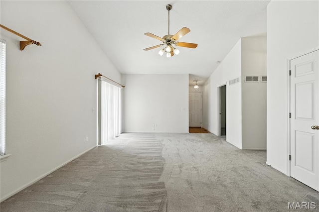 1516 Lienemann Dr Unit 26, Saint Charles, MO 63303 - carpeted empty room with ceiling fan and high vaulted ceiling
