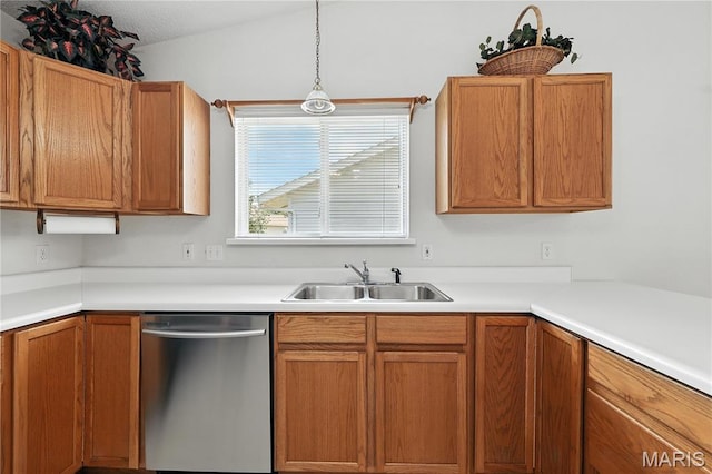 1516 Lienemann Dr Unit 26, Saint Charles, MO 63303 - kitchen with stainless steel dishwasher, light countertops, and brown cabinetry