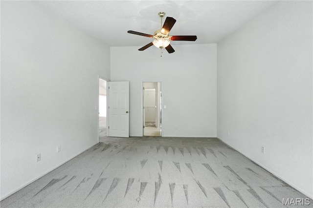 1516 Lienemann Dr Unit 26, Saint Charles, MO 63303 - unfurnished room featuring ceiling fan, carpet, and high vaulted ceiling