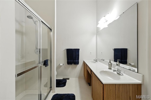 1516 Lienemann Dr Unit 26, Saint Charles, MO 63303 - bathroom featuring double vanity and a shower stall