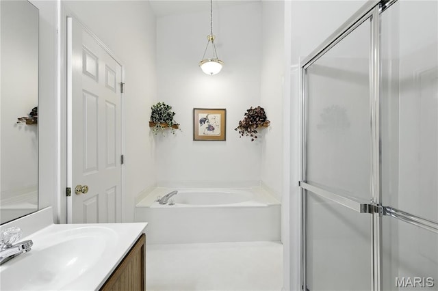 1516 Lienemann Dr Unit 26, Saint Charles, MO 63303 - bathroom featuring vanity, a garden tub, and a stall shower