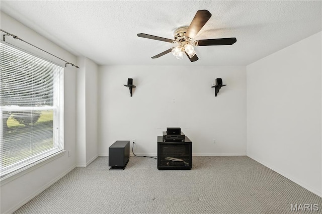 1516 Lienemann Dr Unit 26, Saint Charles, MO 63303 - empty room featuring carpet, a textured ceiling, and ceiling fan