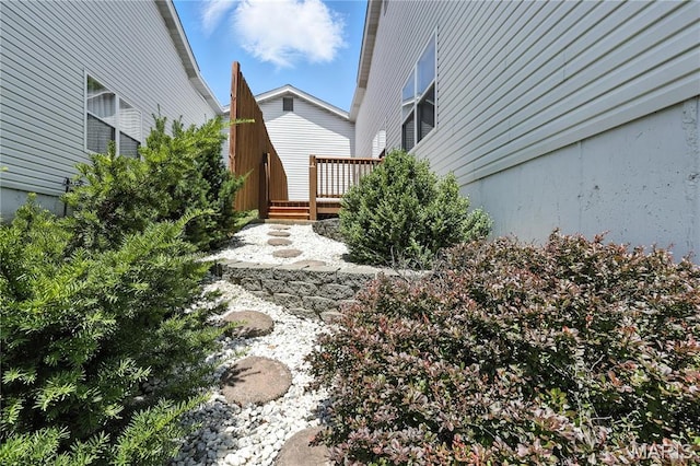 1516 Lienemann Dr Unit 26, Saint Charles, MO 63303 - view of yard featuring a wooden deck