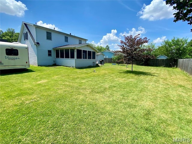 840 Delta Pine Ln, Sikeston, MO 63801 - rear view of property featuring a sunroom