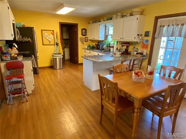 840 Delta Pine Ln, Sikeston, MO 63801 - dining space featuring light wood-type flooring
