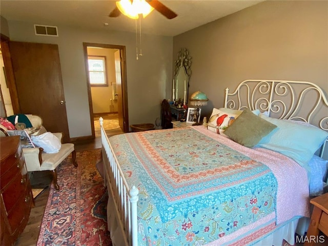840 Delta Pine Ln, Sikeston, MO 63801 - bedroom with wood finished floors, a ceiling fan, and ensuite bath