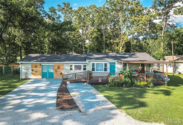 77 Indian Hills Dr, Cuba, MO 65453 - ranch-style home featuring concrete driveway, a front lawn, and a deck