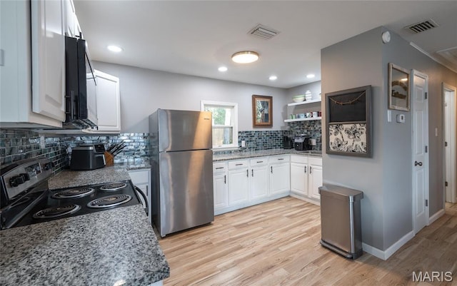 77 Indian Hills Dr, Cuba, MO 65453 - kitchen with appliances with stainless steel finishes, light wood-type flooring, tasteful backsplash, white cabinets, and light stone countertops
