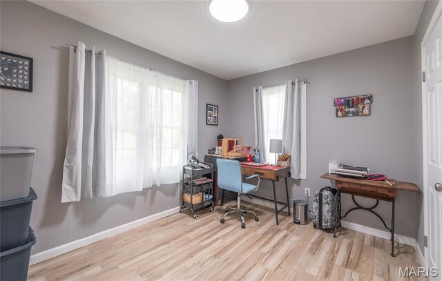 77 Indian Hills Dr, Cuba, MO 65453 - office area with wood finished floors and baseboards