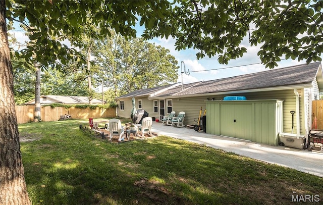 77 Indian Hills Dr, Cuba, MO 65453 - back of property with a patio and a shed
