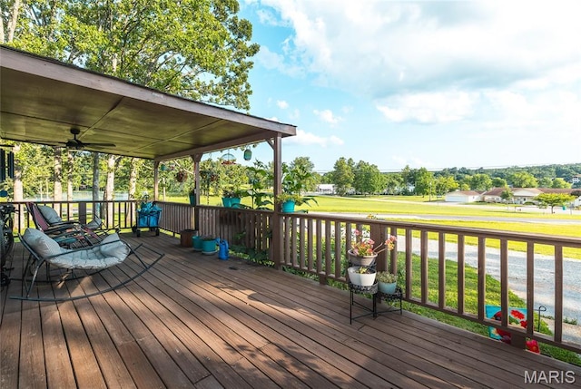 77 Indian Hills Dr, Cuba, MO 65453 - wooden deck featuring a lawn and ceiling fan